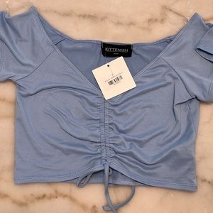 Kittenish Baby Blue crop top very soft fabric never worn